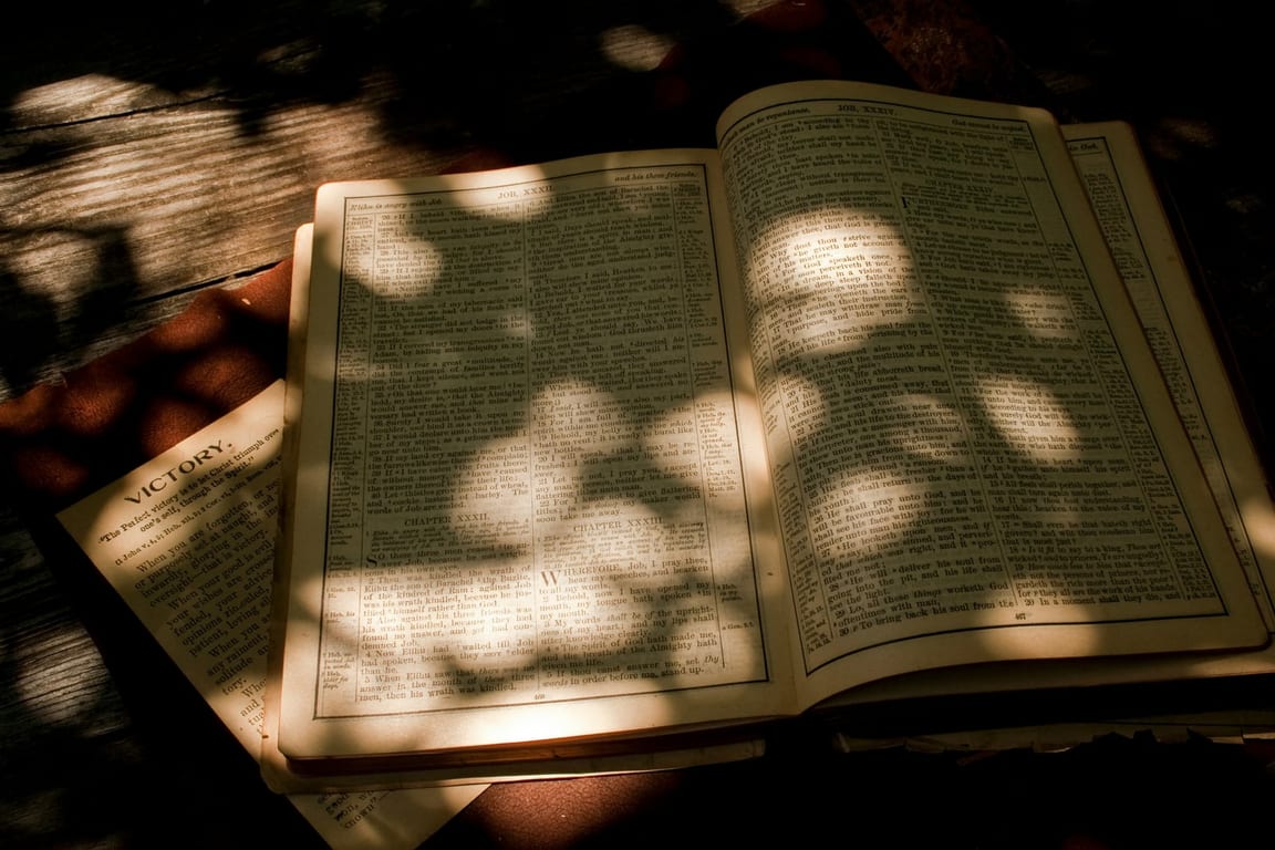 Open Bible with soft light representing peace and comfort from anxiety