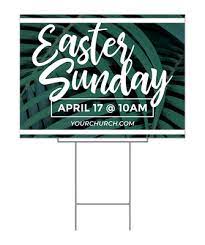 Easter Sunday invitation yard signs outside a church building