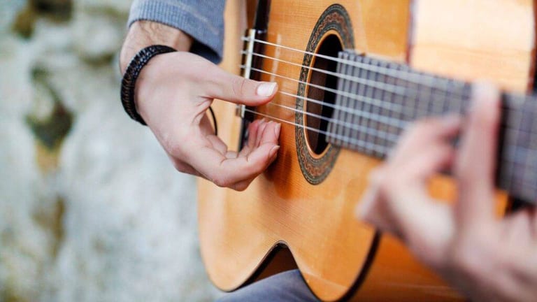 Easter sunrise service worship team playing acoustic music at dawn outdoors